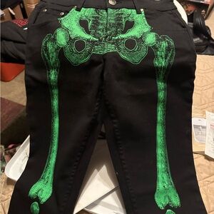 Black Skinny Jeans with Green Skeleton Print
